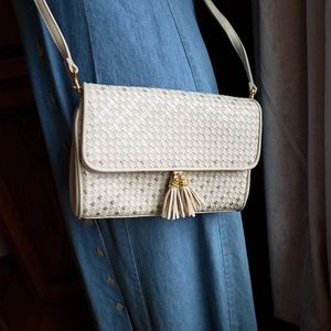 Woven tasseled crossbody